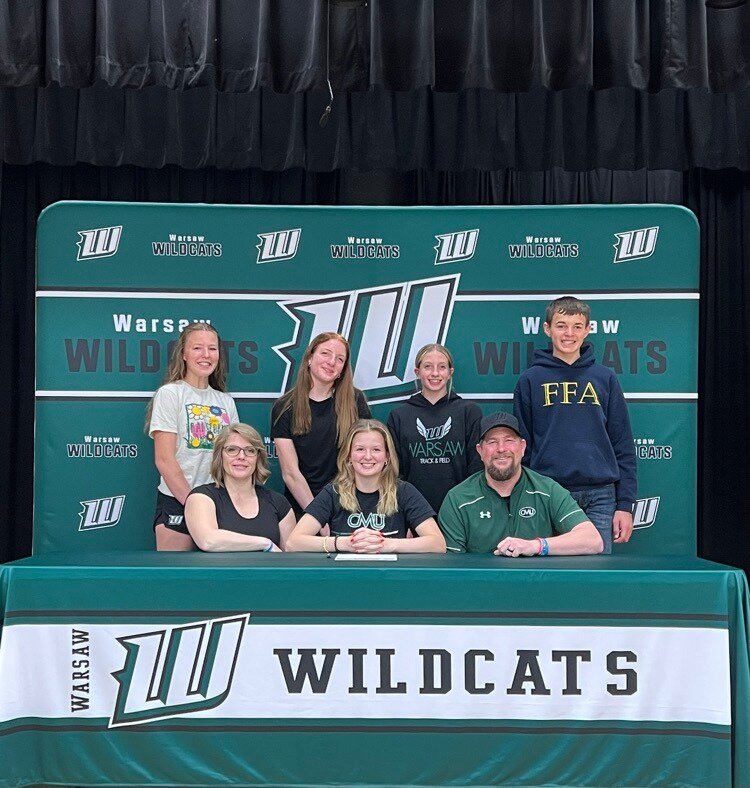 FLY LIKE AN EAGLE, Warsaw's Alysia Yoder has represented Warsaw Wildcats Wrestling with character, integrity, loyalty, and class - core values of the program - and now she’s taking those same qualities to the next level as she signed her letter of intent to continue her wrestling career at Central Methodist University in Fayette. With other family, teammates and coaches also in attendance for her special day, Yoder was joined by parents, Barbara and Daniel, sisters; Aleanah, Naomi and Chloe and brother, Deacon.