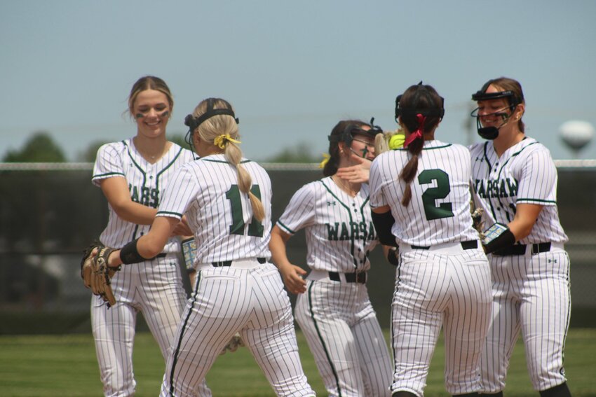 WITH A FIRST ROUND DISTRICT WIN almost in the books, the Ladycats infield celebrated one of the final outs in their 10-0 shutout over Pleasant Hope on Saturday. Warsaw defeated Eldorado Springs in their semifinal on Monday night, 5-1, setting up a re-match with Skyline on Tuesday for the Class 2 District 7 title on the line.