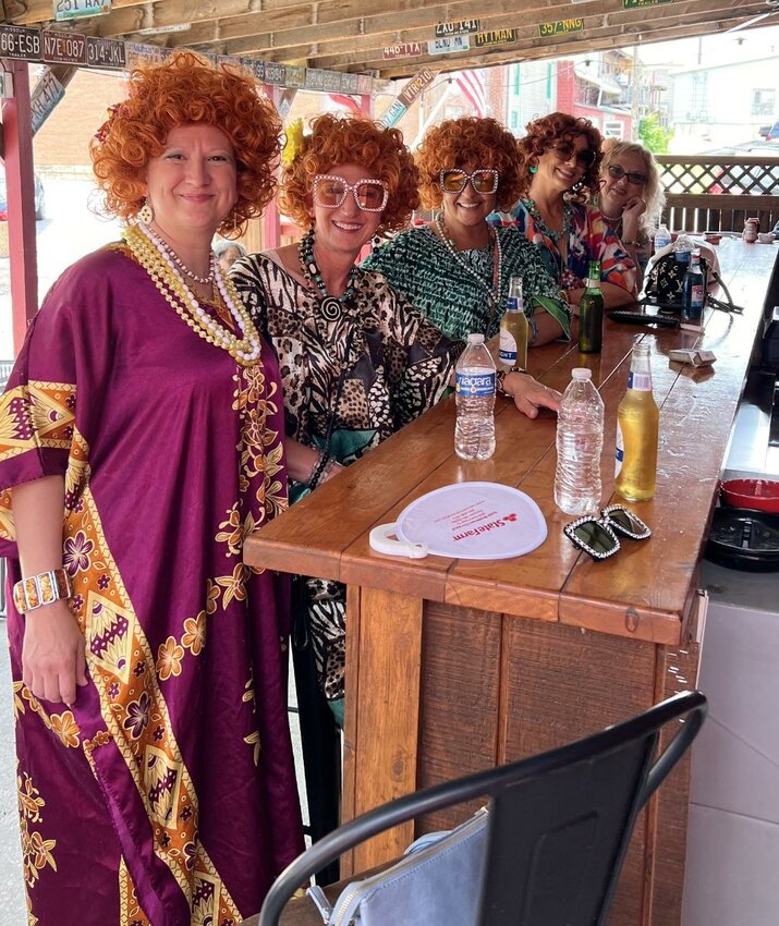 READY TO ROMP, downtown Warsaw will be fluttering this weekend when ladies take to the streets for this year's Mrs. Roper Romp. Some participants from the 2024 event included Latricia Sharp, Suzie Brodersen, Shannon Smith, Terri Burt and Donna Wright.