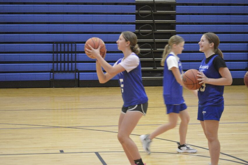 SHOOTING FOR THE STARS, new Lady Bluebird Lilly Mellen put up a free throw in practice. Mellen moved from Lincoln to Cole Camp and should provide an offensive spark for the program.