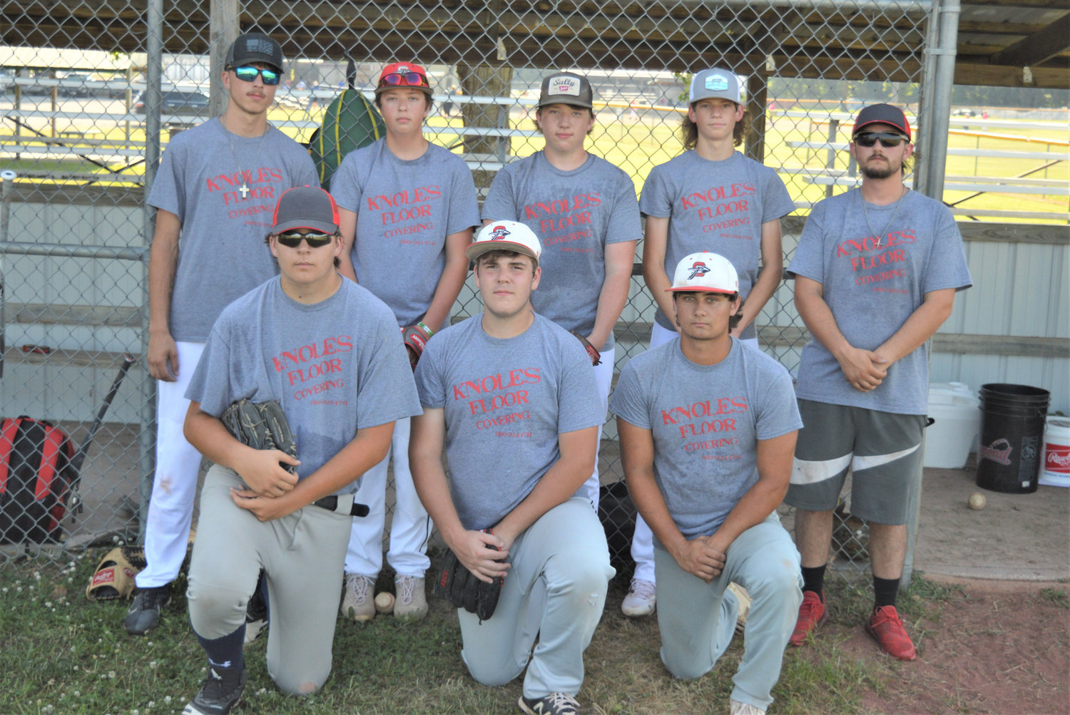 KNOLES FLOOR COVERING Roster: Bottom row (L to R): Justin Burke, Jackson Brown, and Garrett Swift. Top row: Caleb Eaton, Chancey Whitworth, Corbin Dody, Jake Mendenhall, and Coach Lane Knoles. Not pictured: Jonah Kopriva, Skylar Wohlers, and Wyatt Dills.