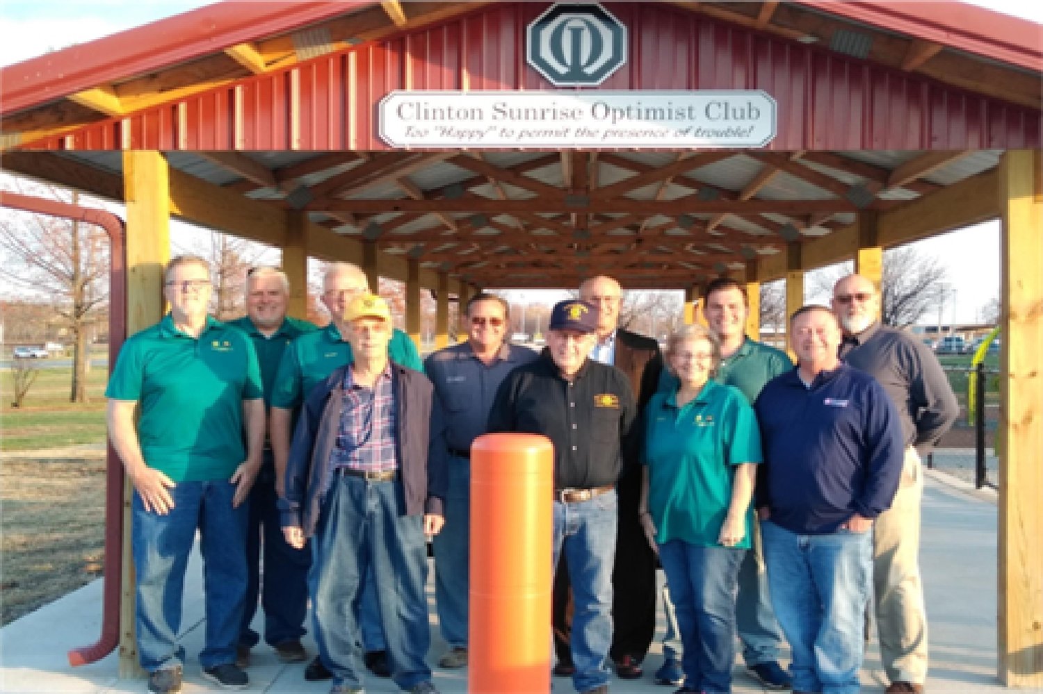 Clinton Sunrise Optimist Club recently celebrated the completion of the shelter house they donated to Clinton Park and Recreation Department. Park and Rec. Director, Brad Combs joined club members for photos. (Front)Tim Powell, Wilbur Caldwell, Sandi Cox, Brad Combs, (back) Don Eaton, Don Varner, Gene Henry, Jim Cook, Steve Bradley, Tom Gregg and Derald Lammers at the Shelter house.