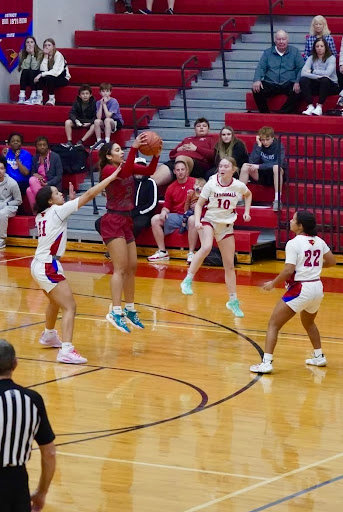 THE DEFENSE of the Lady Cardinals was stifling once again in their win over Warrensburg last Tueday.  Clinton finished the regular season at 21-5 and will begin districts this week.