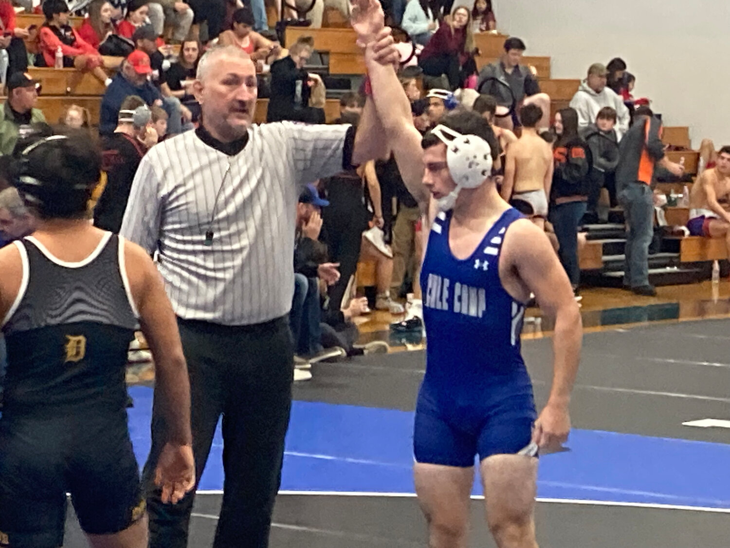 COLE CAMP sophomore Grant Rodriguez had his hand raised at a recent wrestling tournament in Lone Jack. Rodriguez was an All-Conference and All-District running back for the Bluebirds in the fall and will take over at QB for Coach Shearer next season.