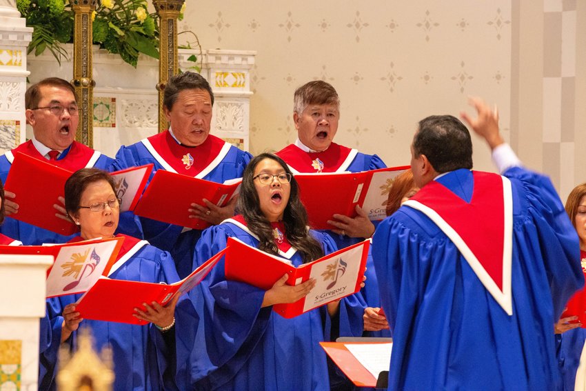 Members of the Fil-Am Choir from St. Gregory the Great Parish in Virginia Beach, Va., sing the offertory hymn during a Jan. 18, 2020, Mass. In a report released last December, the U.S. bishops&rsquo; doctrine committee suggests guidelines for bishops in evaluating hymn lyrics and for selecting hymnals being considered for use in churches.