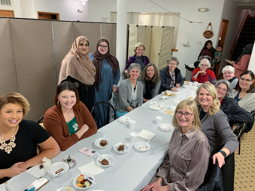 The Islamic Center of Central Missouri hosts fellow Community Sponsorship group members for a meal with Afghan refugee families.