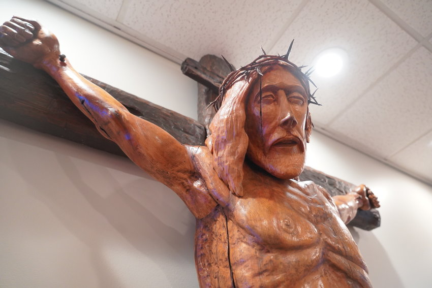 This is the live-size crucifix Hannibal parishioner Delbert Hayes carved for display in Holy Family Church.