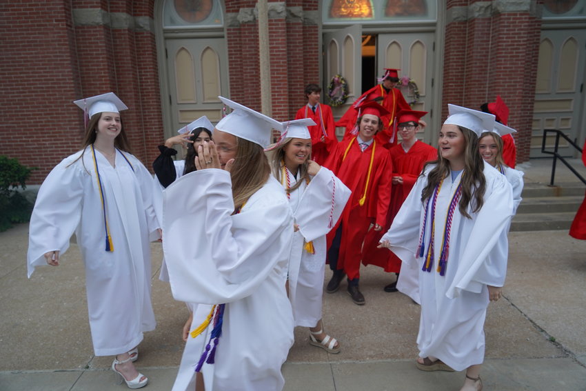 Members of Sacred Heart High School&rsquo;s Class of 2022 celebrate outside the Sacred Heart Chapel in Sedalia following their Baccalaureate Mass on May 20.