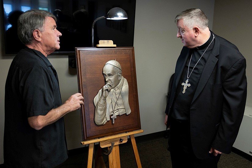 Sculptor Don Wiegand created this bas-relief sculpture of Pope Francis from a picture taken by Pat Raven as the pope was having a discussion with members of the Pontifical Academy of Sciences. Mrs. Raven&rsquo;s husband, Peter, is a member of the academy.