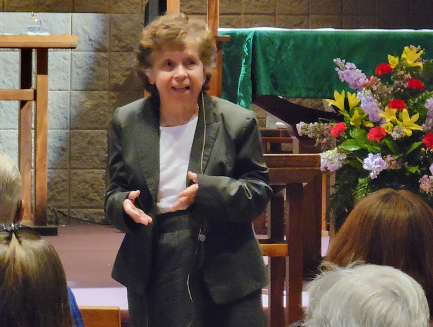 Marie Kenyon, director of the Office of Peace and Justice of the St. Louis archdiocese, gives a presentation on Catholic social teaching as the inaugural speaker for the Martha Trauth Social Justice Education Endowment&rsquo;s annual speaker series on Sept. 15 in the St. Thomas More Newman Center Chapel in Columbia.