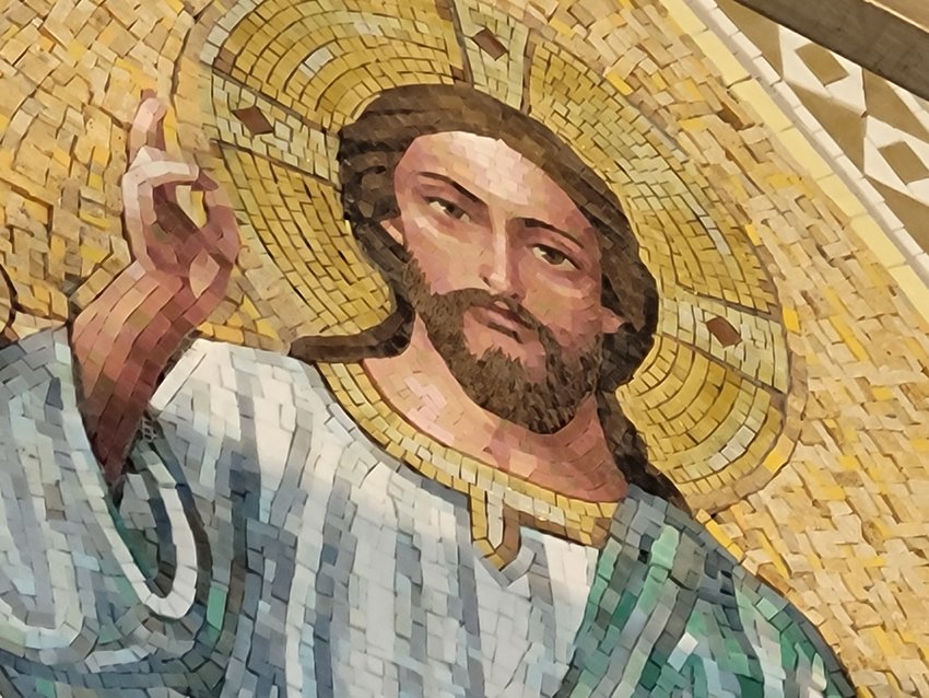 This mosaic image, titled &ldquo;Christ, Ruler of All&rdquo; adorns the space above the main entrance of the Cathedral of St. Joseph. It is made up of hundreds of intricately hand-cut pieces of stone and glass.