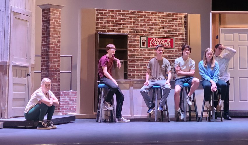 Cast members of Helias Catholic High School&rsquo;s 2023 student musical, &ldquo;West Side Story,&rdquo; rehearse on the set at the Miller Performing Arts Center on Feb. 28.