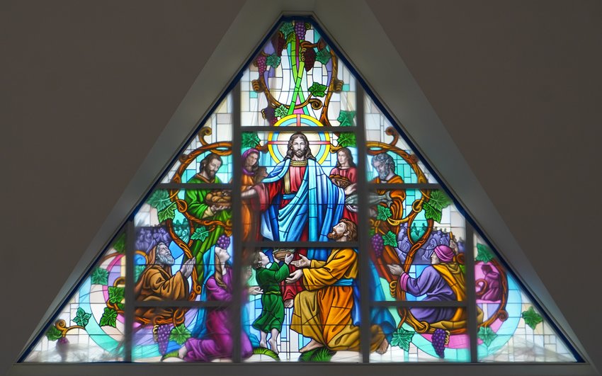 This newly created stained-glass window (partially covered in clear plastic for protection), depicting Jesus feeding the 5,000, is one of three that have been installed in the Cathedral of St. Joseph in Jefferson City as part of an extensive renovation, expansion and upgrade of the 54-year-old Cathedral. An additional nine windows are scheduled to be installed by year&rsquo;s end.