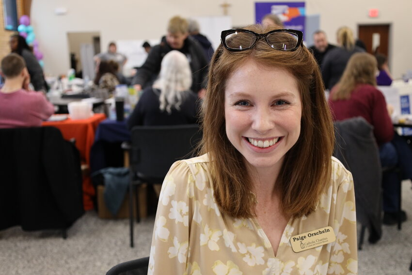 HUD-Certified Housing Counselor, Paige Orscheln, shares resources on securing housing, renting, home-buying and more with visitors of the Second Annual Community Resource Fair in March of 2023. Catholic Charities is one of only two agencies with HUD-Certified Counseling Services across the 38-counties in the Diocese of Jefferson City.