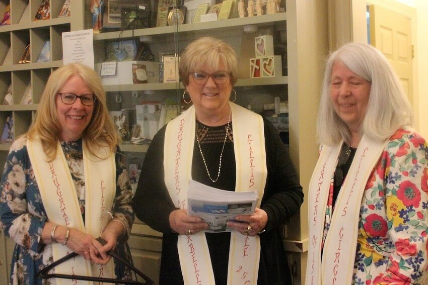 Daughters of Isabella Lillis Circle #250 members Christie Eichelberger, Peggy Fenical and Christine Oswald take part in the circle&rsquo;s 100th anniversary celebration.