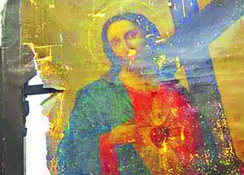 This is a color-enhanced image of a painting from Sacred Heart Church in Denver, recently found in storage over a century after having been damaged in a 1911 fire in the church. It has been donated to the Julia Greeley Guild, which was founded to help tell the Missouri native&rsquo;s story and promote her cause for sainthood.