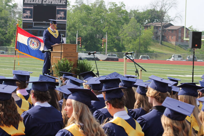 Graduating senior Jack Klebba, one of the two Father Helias Award recipients, proclaims a reading from 1 Timothy during Helias Catholic High School&rsquo;s 2023 commencement ceremony.