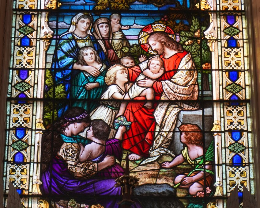 This elaborate stained glass window in St. Martin Historic Church in Starkenburg illustrates Jesus&rsquo;s words, &ldquo;Let the children come to me &hellip; for the kingdom of heaven belongs to such as these.&rdquo; (Matthew 19:14).