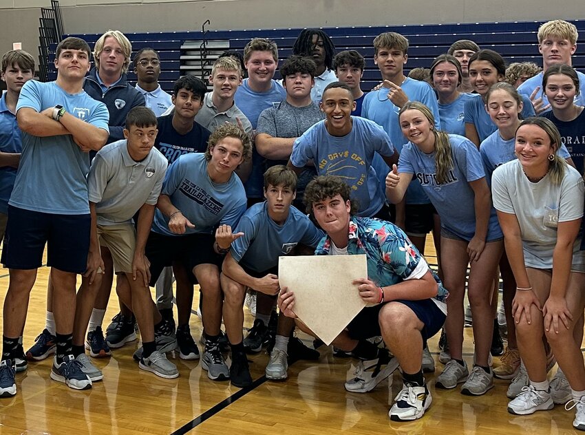 Winners of the Fr. Tolton Regional Catholic High School&rsquo;s house kickball tournament gather for a victory photo in the school&rsquo;s gymnasium. Tolton Catholic&rsquo;s distinctive House System builds up community, brings people from different grade levels together and helps welcome students who transfer from other schools.