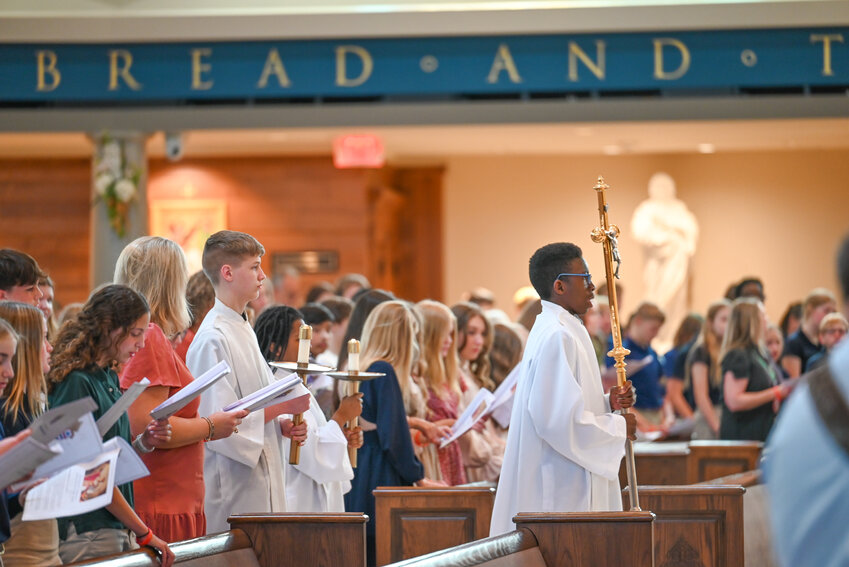 Altar servers process to the sanctuary of the Cathedral of St. Joseph in Jefferson City during the inaugural diocesan Eighth Grade Mass with Bishop McKnight on May 1. More than 500 eighth-graders from the diocese&rsquo;s 37 Catholic schools attended the Mass, followed by a luncheon and festivities in Cana Hall.