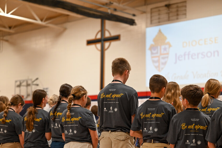 Participants in this year&rsquo;s Sixth Grade Vocations Day wear matching T-shirts emblazoned with the day&rsquo;s theme: &ldquo;Called to Sainthood&rdquo; on the front and &ldquo;Be not afraid!&rdquo; on the back.