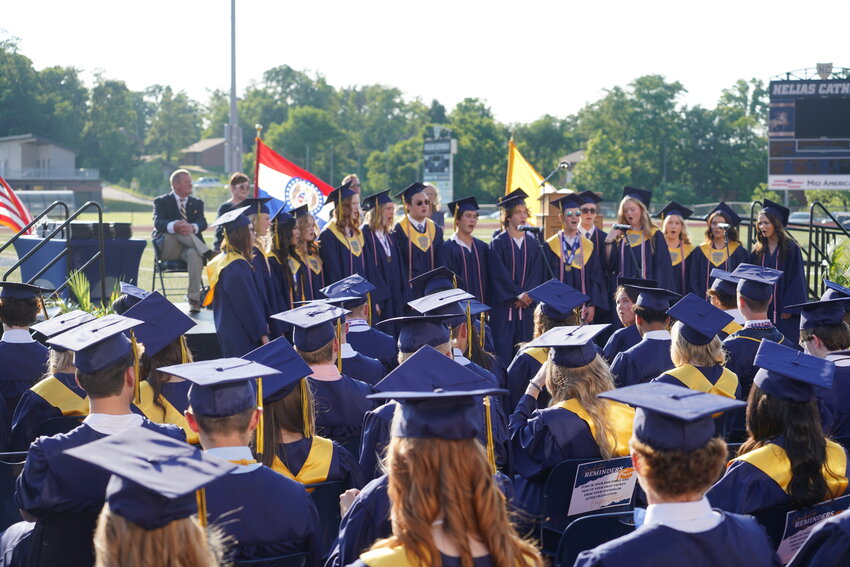 Members of the Helias Catholic High School Class of 2024 listen to the singing of their class song during Commencement on May 19, 2024.