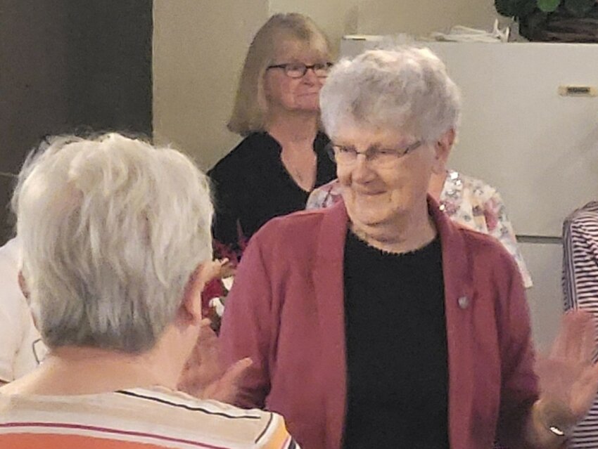 Sister Virginia Meyer of the School Sisters of Notre Dame addresses friends and well-wishers at a brunch reception after Mass in St. Anthony Church in Rosati June 13 to celebrate the 70th anniversary of her religious profession.