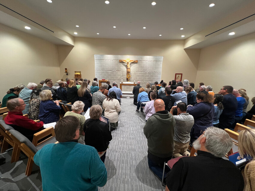 People from parishes throughout the Jefferson City diocese join together in Adoration of the Most Blessed Sacrament in the St. Alphonsus Liguori Chapel at the Alphonse J. Schwartze Memorial Catholic Center, during a Nov. 3 training workshop for helping to build a vocation-oriented culture in their parishes.