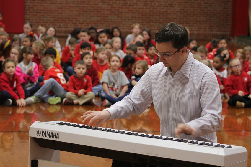 Internationally renowned ragtime piano scholar and performer Adam Swanson plays Scott Joplin&rsquo;s &ldquo;Maple Leaf Rag&rdquo; before a group of young students at Sacred Heart School in Sedalia. The famous piece was composed in Sedalia.