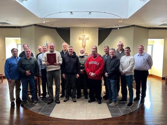 Deacon John Schwartze (holding book), diocesan the Director of Diaconate Formation, joins the class of deacon candidates who hope to be ordained this year, on their canonical retreat at Conception Abbey in northwestern Missouri.