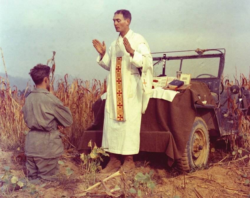 Father Emil Joseph Kapaun, a U.S. Army chaplain, is pictured celebrating Mass from the hood of a jeep Oct. 7, 1950, in South Korea. While he continued treatment at Rome&rsquo;s Gemelli hospital, Pope Francis issued a series of decrees regarding several sainthood causes Feb. 24, 2025, including for Fr. Kapaun, a U.S. Army military chaplain who died in a prisoner of war camp in North Korea in 1951. The pope recognized his sacrifice as an &ldquo;offering of life,&rdquo; a category distinct from martyrdom that the pope established in 2017.