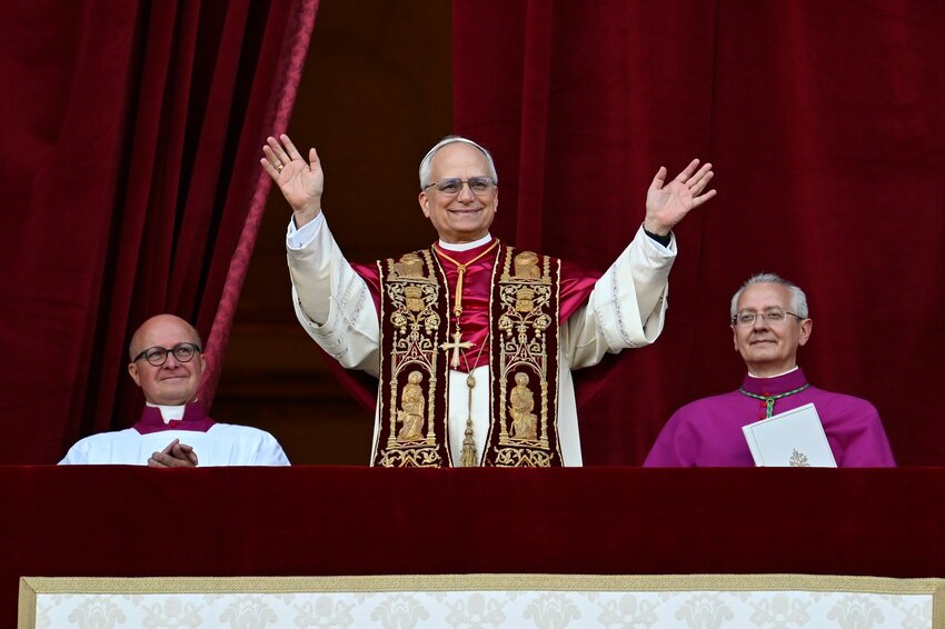 Pope Leo XIV, the former Cardinal Robert F. Prevost, waves to the crowds in St. Peter&rsquo;s Square at the Vatican after his election as pope May 8, 2025. The new pope was born in Chicago.