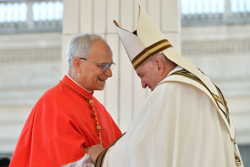 Pope Francis greets then-Cardinal Robert F. Prevost during a consistory in St. Peter's Square at the Vatican Sept. 30, 2023. U.S.-born Cardinal Prevost became the first American pope in history when he was elected at the Vatican May 8, 2025, choosing the papal name Leo XIV. He succeeded Pope Francis, who died at age 88 April 21, 2025.