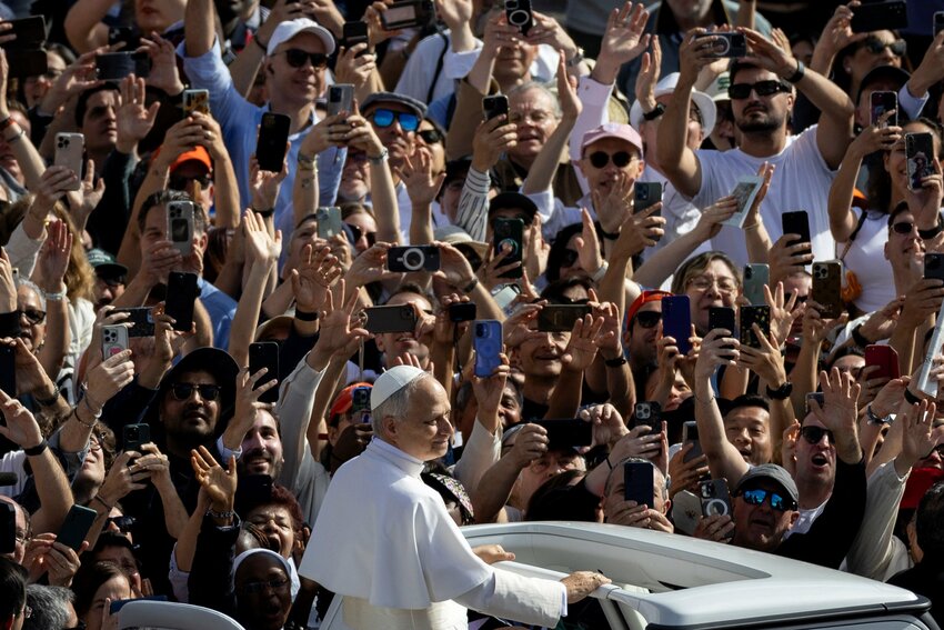 Pope Leo XIV, formerly Cardinal Robert Francis Prevost, smiles as he arrives to celebrate his inauguration Mass at the Vatican May 18, 2025. He is the first American pope in history.