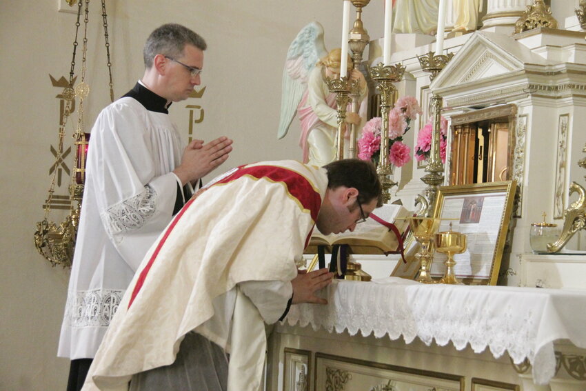 Father Dylan Schrader offers Solemn High Mass in Latin using the 1962 edition of the Roman Missal for the Solemnity of the Sacred Heart of Jesus on June 28, 2019, in St. Joseph Church in Westphalia.