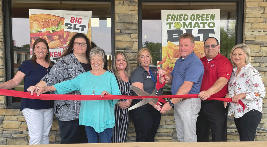 The new Jack&rsquo;s location in Eton sold its first hamburger and fries last week. Among those celebrating with a ribbon cutting were (from left) Kim Hall (city clerk), Traci Rankin (city council), Joan Dooley (city council) , Media Patterson (assistant city clerk/court clerk), Billy Cantrell (mayor), Toni Bickster (Jack&rsquo;s), Dan White (Jack&rsquo;s) and Rhonda Reeves (Jack&rsquo;s).