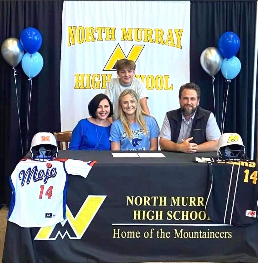 Brooke, Abby, Eli and Jon Young on signing day at North Murray High School.