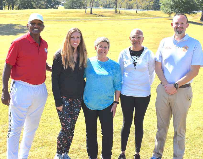 Former Atlanta Braves outfielder and World Series standout Otis Nixon surprised participants at the annual Georgia Sheriffs Association Golf Tournament at Indian Trace in Chatsworth last week. Known for his base stealing skills as well and &lsquo;The Catch&rsquo; in the 1992 World Series, Nixon brought baseballs and signed them individually for golfers participating in the fundraiser.  From left,  Nixon, Cherokee Estate and MountainView staffers Tiffany Hammontree, Cindy Lock, and Nikita Jordon, and Murray County Sheriff Jimmy Davenport.