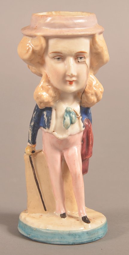 This fanciful bisque match holder made to look like a man sold for $59 at Conestoga Auction.