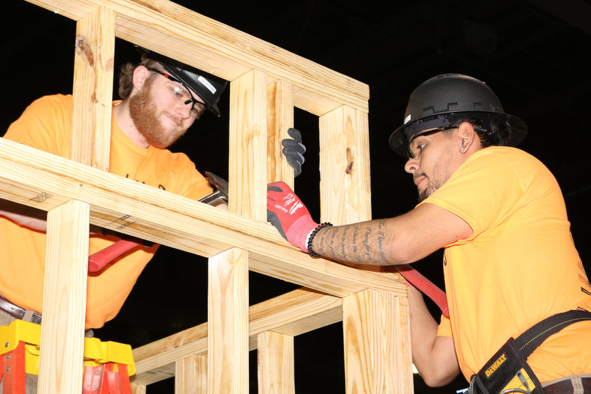 GNTC students Garrett Knight (left) and Christopher Herrera compete in the TeamWorks construction category.