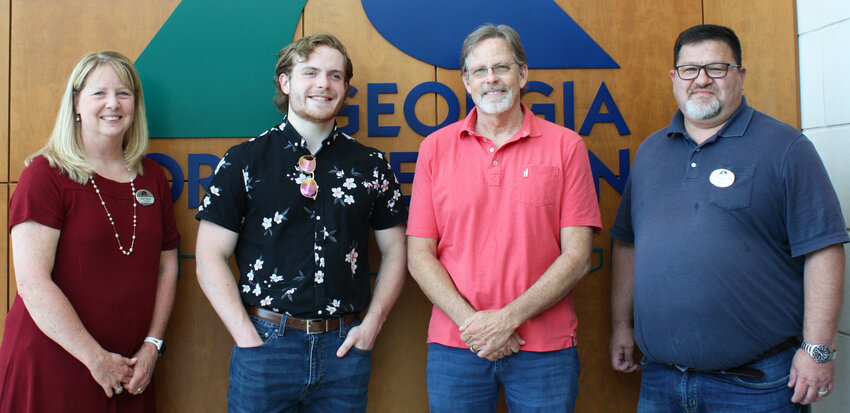 From left, Dr. Heidi Popham, GNTC president; GNTC student Carter Norton; David Perry, president and owner of&nbsp;North Georgia Equipment Heating and Air Conditioning (NGE); and Chad Wheat,&nbsp;program director and instructor of Air Conditioning Technology, celebrate Norton&rsquo;s receipt of the NGE Scholarship.
