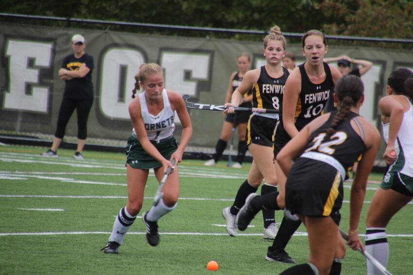 ME Senior Caelie Patrick faces the Bishop Fenwick defense as she moves towards the goal.