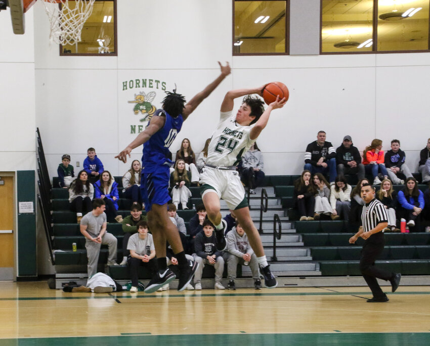 ME Hornets cruised to a 64-42 win over Randolph on Wednesday night at home.  Here Graham Lewis goes up for a shot in the first quarter of the game.  The win puts them at the top of CAL with an overall 19-1 season.