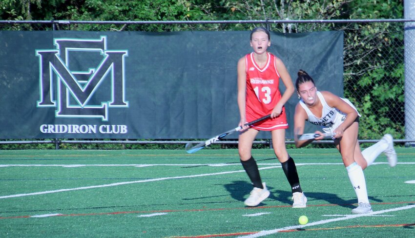 Hornet Sarah Broadbent fires the ball towards the Amesbury goal during the team’s first home game.  The Hornets prevailed over the Red Hawks, 6-0.  The ME defense allowed one shot at goal in four quarters.