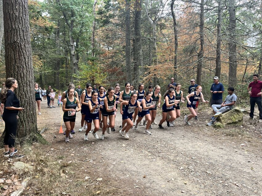 ME girls cross country team heads out at the start of a match with Ipswich.