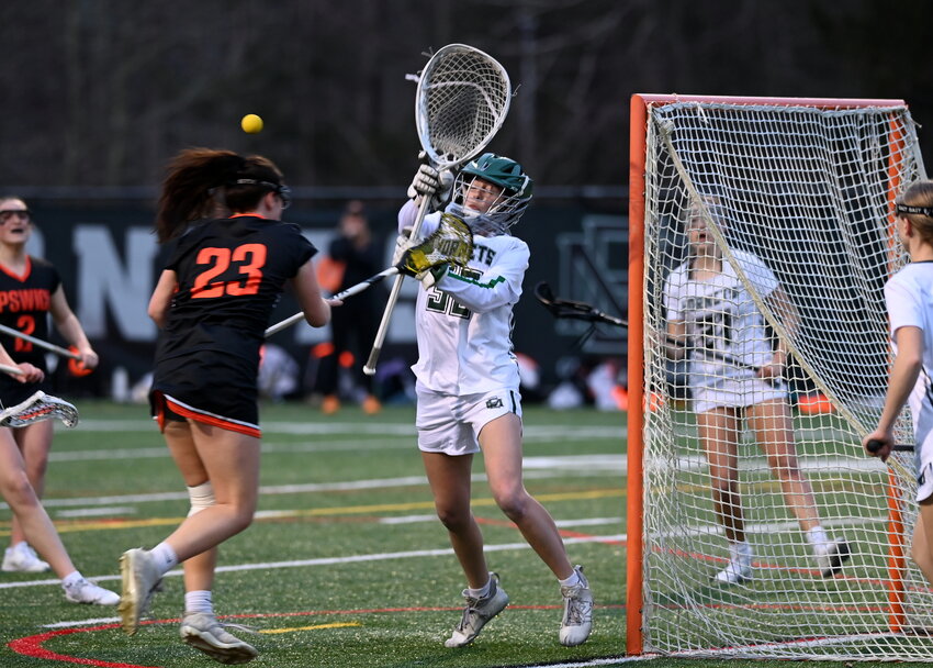 Brigid Carovillano makes a save against Ipswich during a home joust at Hyland Field. The Hornets are 3-3-0 for the season.