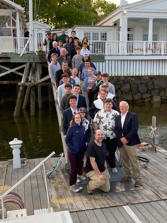 <p><em>Parents, coaches and sailors pose at the Manchester Yacht Club at the end of the coed sailing season.</em></p>