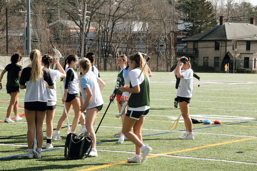 ME Hornet girls’ lacrosse team prepares to hit the field on the first day of practice this season.