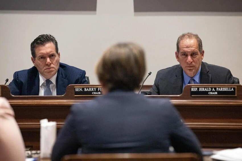 Sen. Barry Finegold and Rep. Jerald Parisella of Beverly, co-chairs of the Joint Economic Development Committee, listen to testimony from Gov. Maura Healey on Tuesday, May 7, 2024.