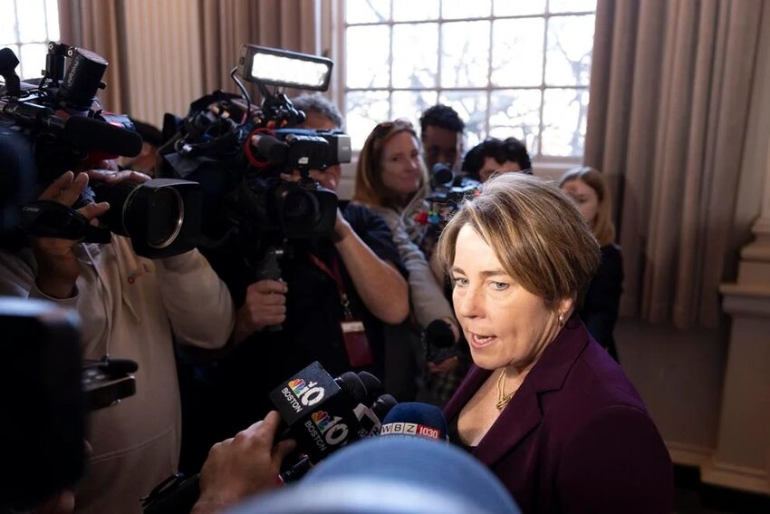 Gov. Maura Healey speaks with reporters at Newton City Hall on Nov. 25, 2024.